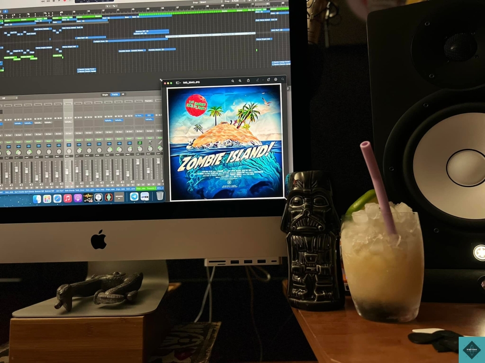 Mai Tai-s and new material.... not a bad way to spend a rainy evening.  The guitars will be recorded in single takes once the arrangement is complete.